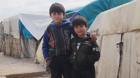 Syrian refugee children in a camp near the Syrian-Turkish border. Refugees in the winter.
Aleppo, Syria January 16, 2020