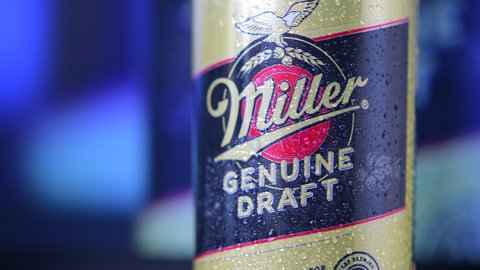 Toronto, Canada - December 30, 2021: Miller Genuine Draft beer can covered in water droplets