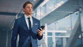 Airport Terminal: Businessman Walks to His Flight Gates, Uses Smartphone, Doing e-Business, Browsing the Internet with App. Digital Entrepreneur Remote Work Online While Traveling Through Airline Hub - Powered by Shutterstock - Get 15% off with code: PIKWIZARD15