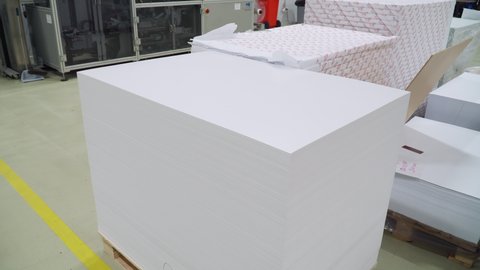 prepared stack of paper for printing books. plant for the production of books, magazines and newspapers. print material