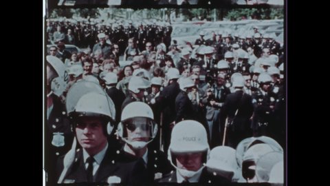 1971 Washington, DC. Capitol Police and D.C. Metro Police protect the Capital and arrest Violent Insurrectionist for attack on the federal building. 4K Overscan of Vintage Archival 16mm Newsreel Film 