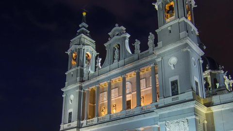 Santa Maria la Real de La Almudena illuminated at night timelapse hyperlapse - Cathedral in Madrid, Spain