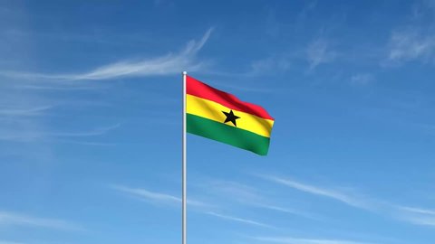 Waving flag of Ghana with clear blue sky background