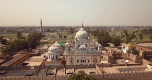 4K Aerial Footage View to the Samadhi of Ranjit Singh with the City View to Lahore, Pakistan