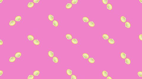 Colorful pattern of rotating condoms on pink background. Seamless pattern with condom. Top view. Realistic animation. 4K video motion