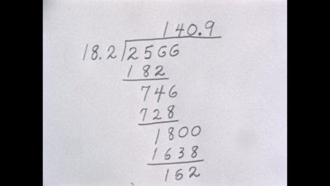1950s: Division calculation. Parts of a division calculation being pointed out.