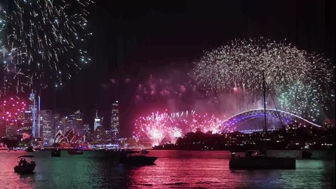 SYDNEY, NSW, AUSTRALIA. JANUARY 01 2022. First one minute of Sydney 2022 new years day fireworks, with sound.