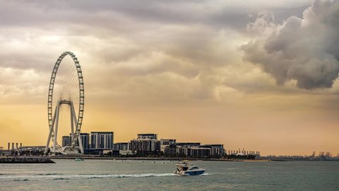 Timelapse Video of Dubai Eye and Bluewaters Island during a Cloudy Day. Dubai - UAE. 1 January 2022