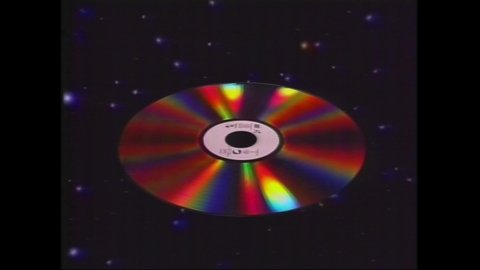 1990s Hollywood, Los Angeles, CA. Computer Animation of LaserDisc Motion Graphic. A laser beam burn data onto home video format. 4K Scan from LaserDisc File. Seamless Loop for Night Club or Video Wall