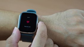 people measure heart rate with smart watch - Powered by Shutterstock - Get 15% off with code: PIKWIZARD15