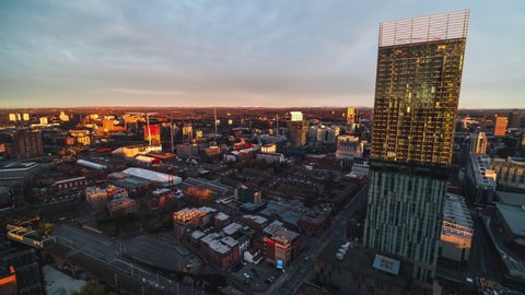 Manchester, Great Britain - circa 2021 - Establishing Aerial View Shot of Manchester, City Skyline, England United Kingdom, outstanding view of city