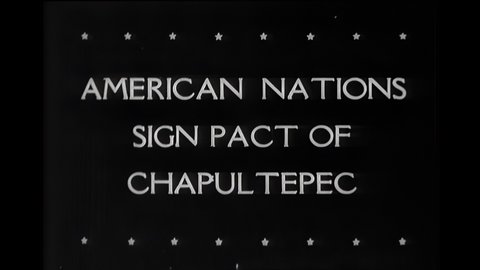 1940s: North, Central and South American nation representatives sit at table. Mexico's foreign minister signs Chapultepec pact". Representatives sign with pens.