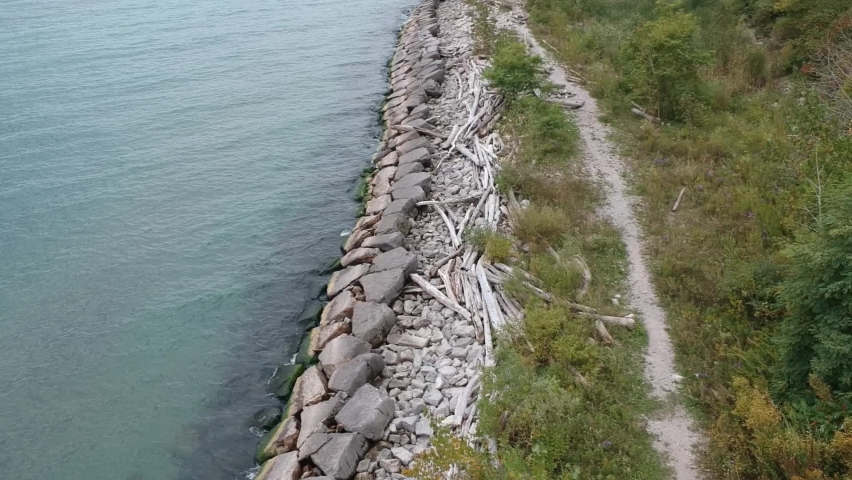 Lakefront Shoreline Trail Rock-wall Dead Tree Stumps Grass Hill Shrubs Lake Ontario Great Lakes