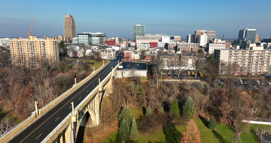 Aerial truck shot of viaduct bridge, Allentown PA, Pennsylvania USA. Winter daytime view establishing shot.
