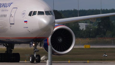 MOSCOW, RUSSIAN FEDERATION - JULY 29, 2021: Boeing 777 of Aeroflot taxiing at Sheremetyevo Airport (SVO). Russian company Aeroflot boeing 777 closeup shot