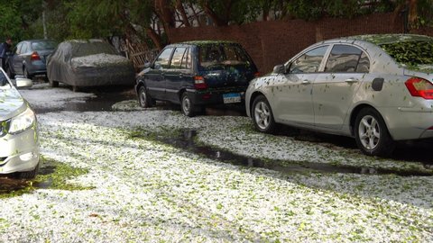 street with cars in Egyptian city Hurghada after Snow and hail fell