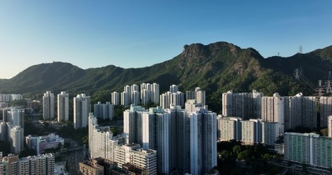 Aerial view of Hong Kong city with lion rock mountain