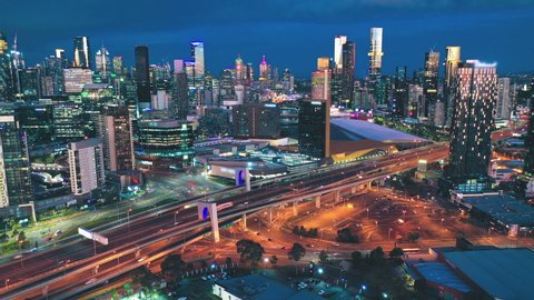 Aerial hyperlapse video of Melbourne city and highway traffic at night