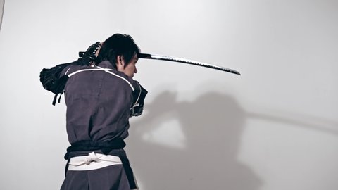 Samurai wielding a sword. Japanese traditional warrior.