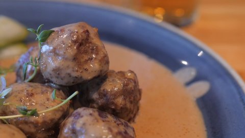 Delicous Swedish meatballs covered with fresh sauce.