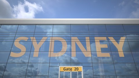 SYDNEY city name and landing plane at modern airport