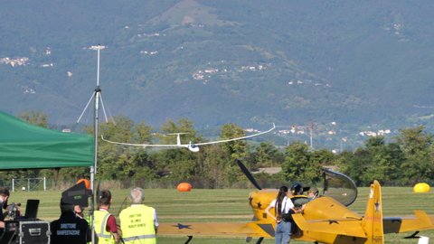 Thiene Italy OCTOBER, 16, 2021 Glider with jet engine turbine low pass at high speed. Jonker Sailplanes JS3 Rapture uses a small jet turbine to go back to home airport in case of lack of thermal 