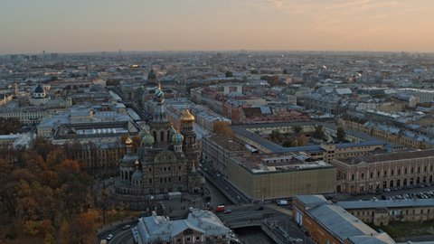 Cinematic view of Saint Petersburg city. Church of the Savior on Blood at sunset. 