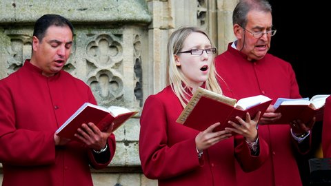 Norwich, Norfolk, United Kingdom. Circa August 2021. Choristers from Church of Saint Peter Mancroft, Norwich sing hymns at outdoor service.