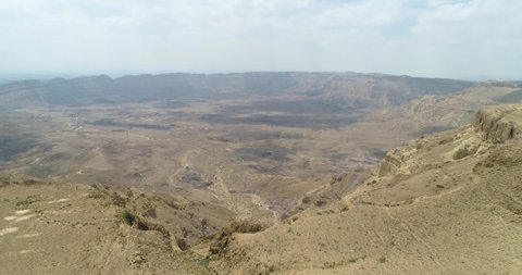 Aerial view from the edge of the small makhtesh, called HaMakhtesh HaKatan, a geological erosional landform crater. HaMakhtesh HaKatan, Negev, Israel.