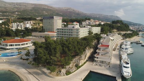 Split , Croatia - 12 12 2021: Split, Croatia - DECEMBER 2021: Aerial Rise Up Shot Over Le Méridien Lav Hotel and Re:Cupera Wellness and Spa, Marina Lav, Split Croatia