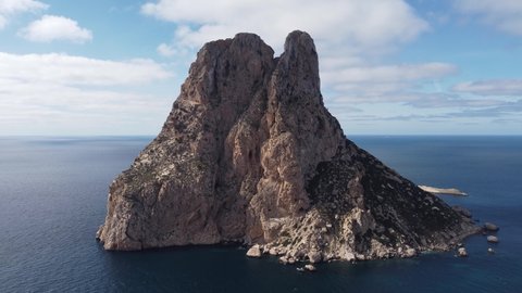 The iconic islands Es Vedra and Es Vedranell, on the west coast of Ibiza. Video recorded with drone.
