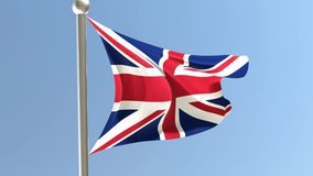 United Kingdom flag on flagpole. British flag fluttering in the wind.