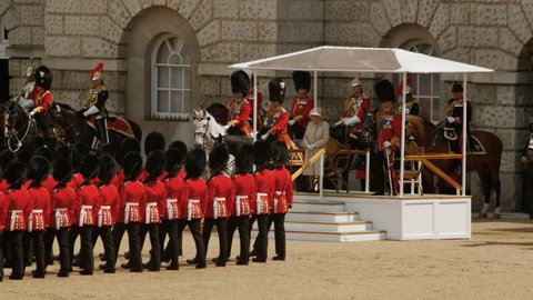 LONDON, circa 2019 - The Grenadier guards march in front of Her Majesty the Queen of England during the Trooping the Colour military parade
