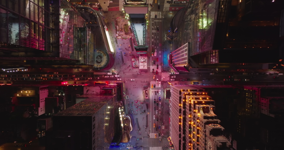 Aerial birds eye overhead top down ascending view of cars driving on streets passing through Times Square. Manhattan, New York City, USA | Shutterstock HD Video #1084855363