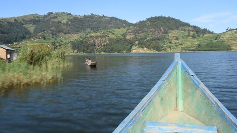 Lake Bunyoni, Uganda - 10 Dec 2021: Life on boats around Uganda's deepest lake