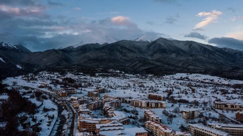 Time lapse with an aerial winter view of famous ski resort of Bansko, Blagoevgrad Region, Bulgaria