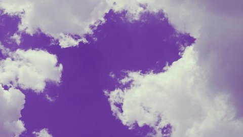Unusual Violet Purple Skyscraper. Violet Sky White Puffy Clouds, Open Clear Violet Sky, Timelapse, Slow Motion. Abstract Natural Violet Background 4K.