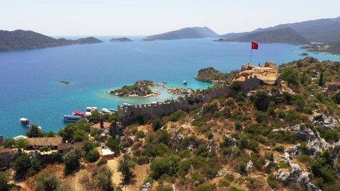 Kekova, also named Caravola, is a small Turkish island near Demre district of Antalya province which faces the villages of Kaleköy and Üçağız. Kekova has an area of 4.5 km² and is uninhabited.	