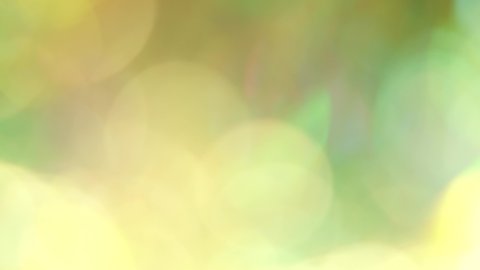 Beautiful shiny Christmas winter holiday yellow and orange colors abstract 4k stock video bokeh background