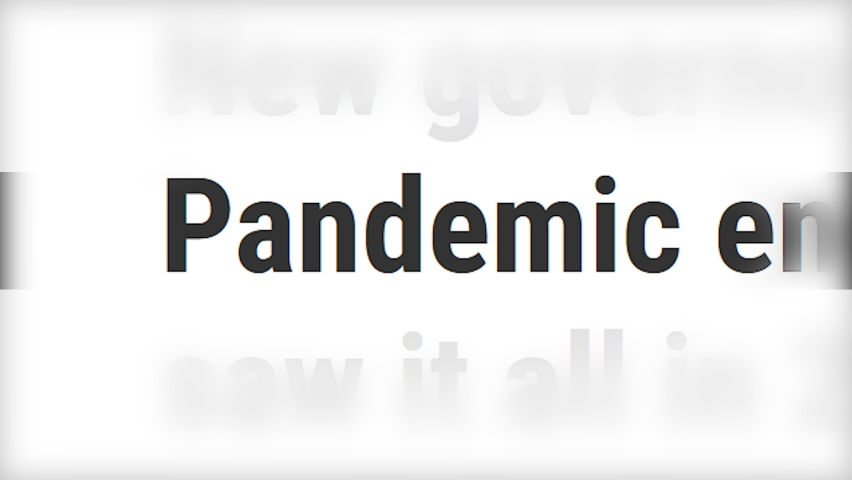 Pandemic of viral infection is in the headlines. Coronavirus, a concept of dissemination in electronic media. Close-up of the text of the articles is changing rapidly.