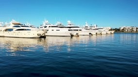 A super clean smooth video of yachts lined up.