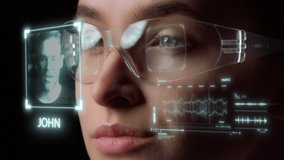 Metaverse futuristic glasses recognition system identifying caller accepting incoming call. Woman touching smart internet connection goggles talking girl close up. Technological future video device  - Powered by Shutterstock - Get 15% off with code: PIKWIZARD15