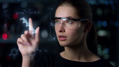 Digital glasses woman biochemist inspecting DNA hologram looking for deviations. Closeup professional scientist analysing rna spiral checking genes modern holographic device. High-tech science concept