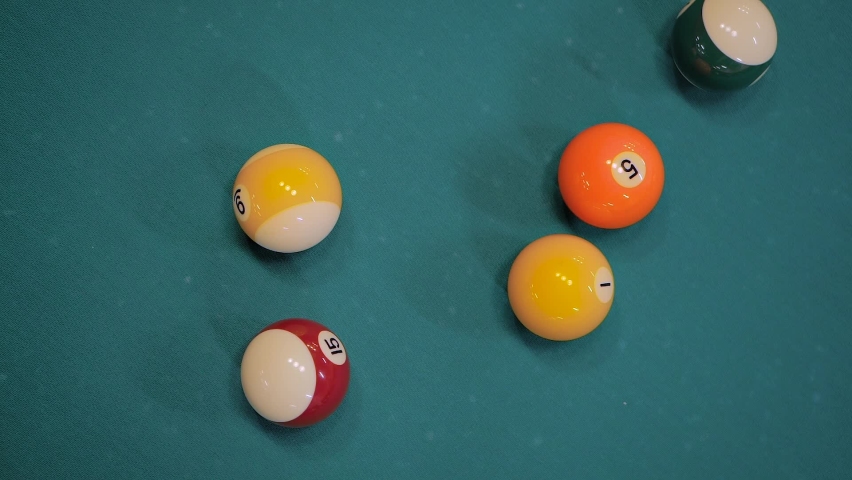 Slow motion: hitting colorful pool balls on teal billiard table - close up, top view. Sport, game, competition, hobby and leisure time concept | Shutterstock HD Video #1084899481