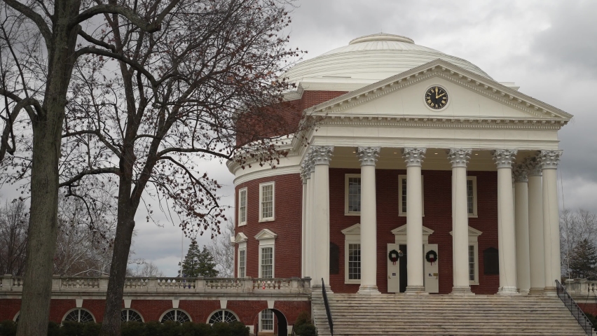 Portrait of a young teen female student at UVA, University of Virginia in Charlottesville, VA in front of the Rotunda designed by Thomas Jefferson.