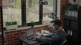 Business man working on financial management in startup office. Company employee with face mask planning commercial development to create e business investment. Project manager - Powered by Shutterstock - Get 15% off with code: PIKWIZARD15