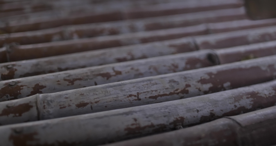 Old mud house in rural India showing weathered walls and traditional earthen construction. Abandoned or partially damaged village home representing rural architecture, traditional building methods, and countryside living conditions.