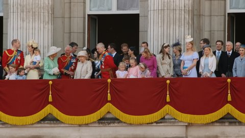 LONDON, circa 2019 - Queen Elizabeth II and the British Royal Family wave at the crowds from the balcony of Buckingham Palace in London