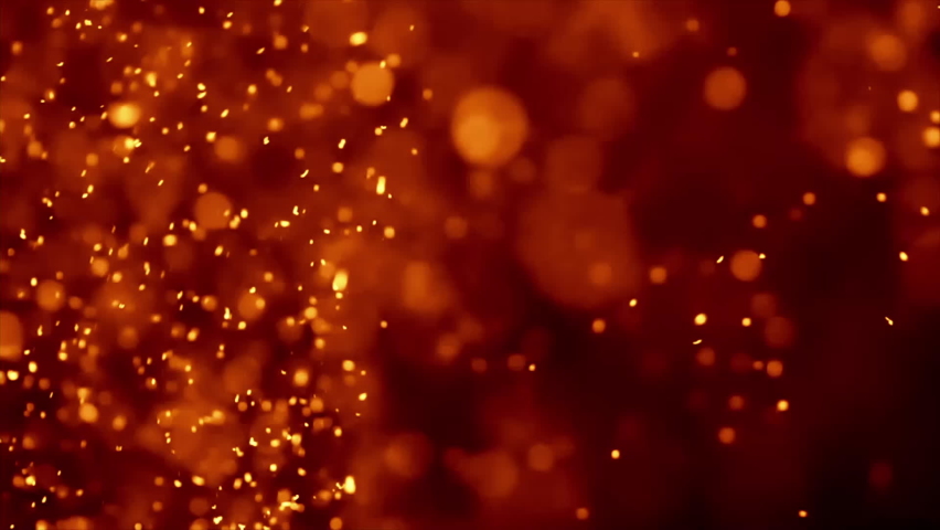 Fire embers against a black backdrop stock footage Royalty-Free Stock Footage #1084923400