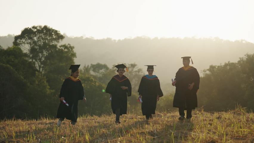 Graduates wear a black dress, black hat at the university level.